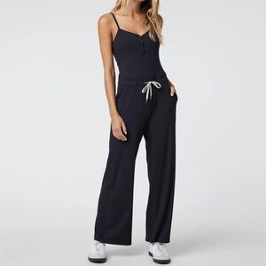 Women's Vuori Pose Henley Black Jumpsuit